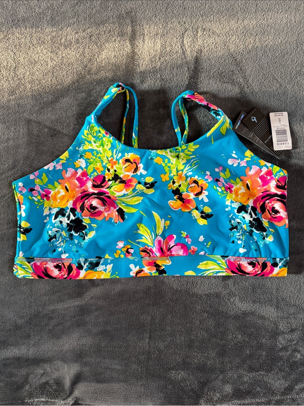 Women’s Floral Sports bra in Turquoise with vibrant floral pattern